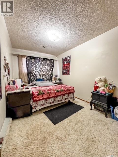 216 15Th Avenue Ne, Swift Current, SK - Indoor Photo Showing Bedroom