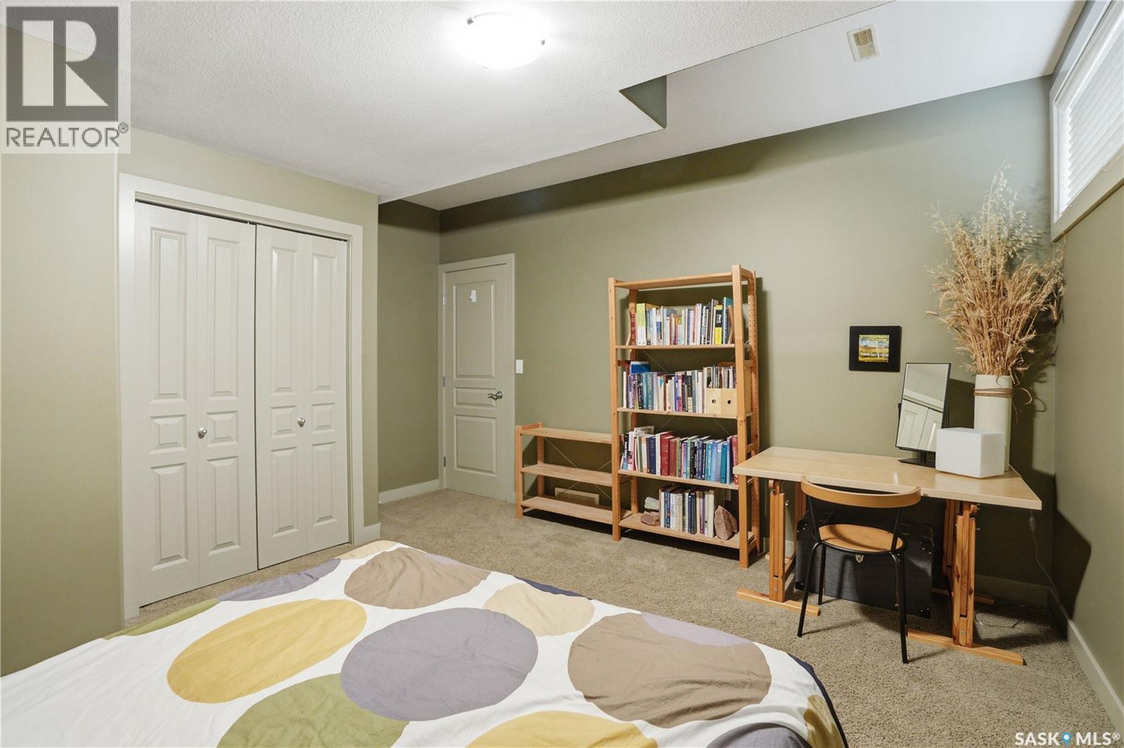 102 802 Heritage Crescent, Saskatoon, SK - Indoor Photo Showing Bedroom