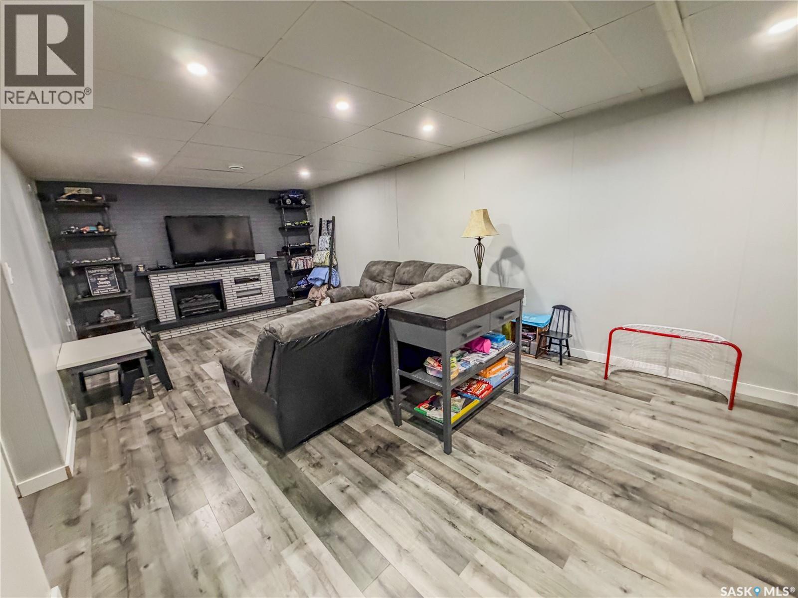 210 Wells Avenue E, Langenburg, SK - Indoor With Fireplace