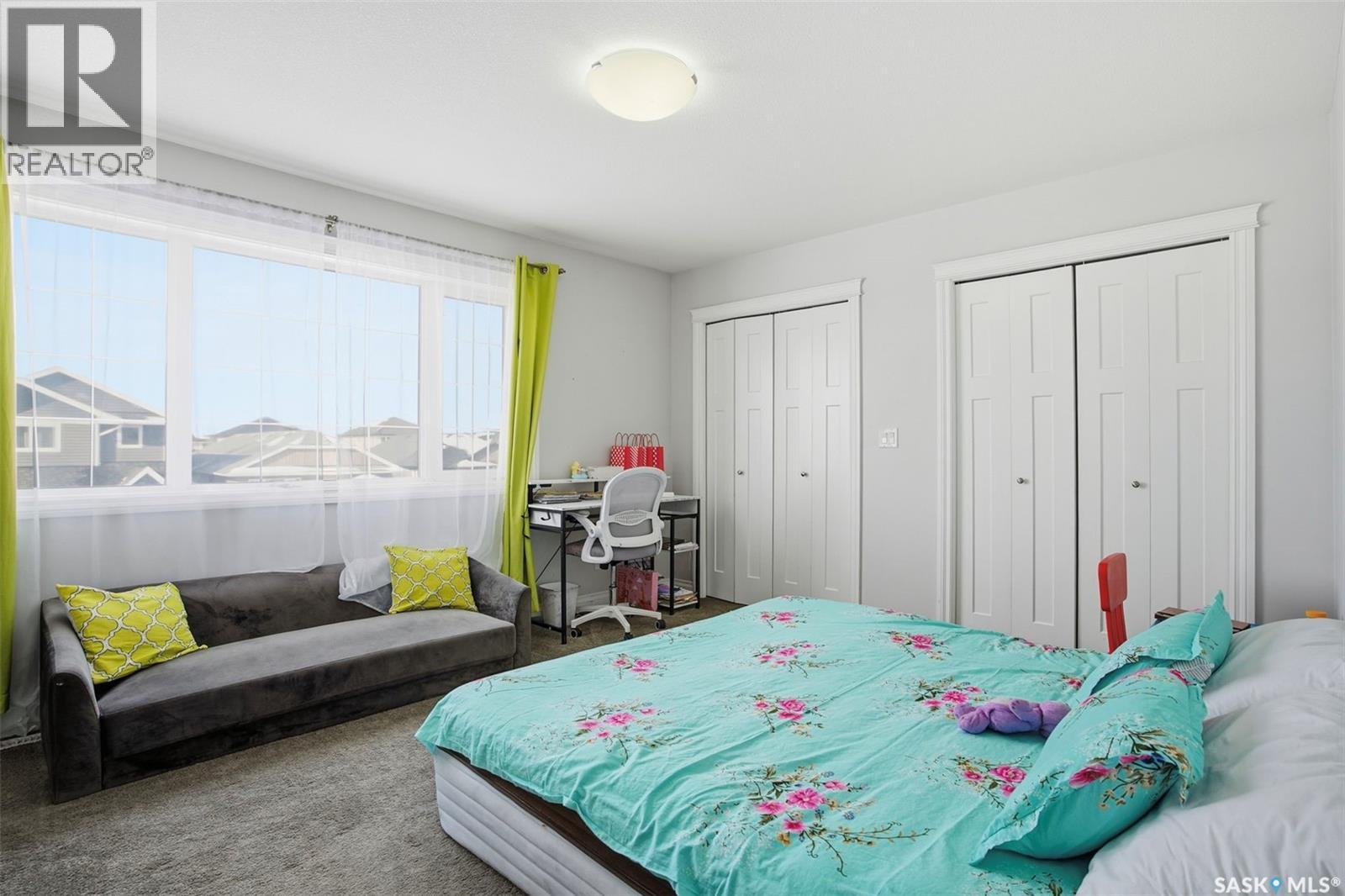 215 Wyant Lane, Saskatoon, SK - Indoor Photo Showing Bedroom