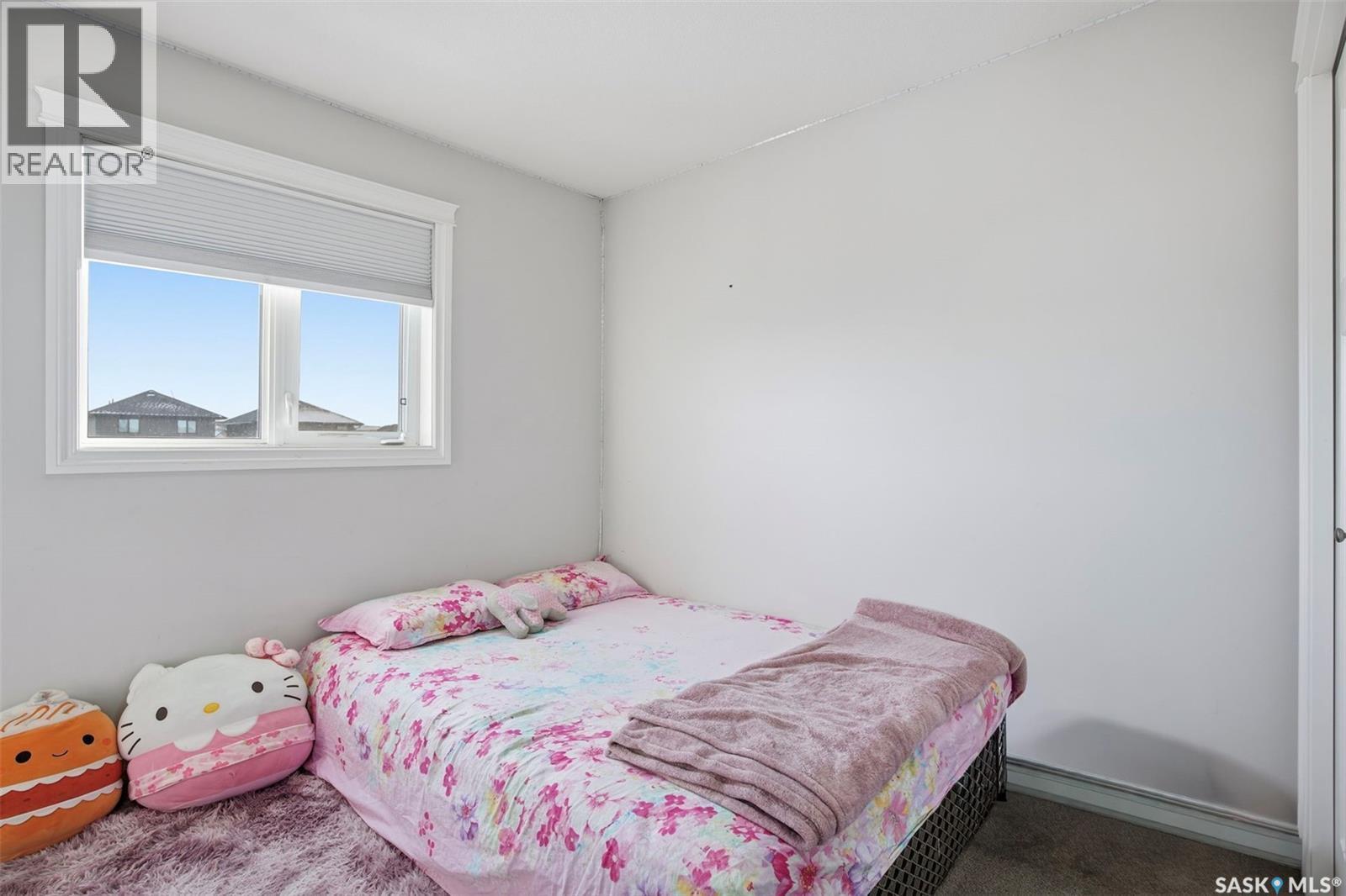 215 Wyant Lane, Saskatoon, SK - Indoor Photo Showing Bedroom