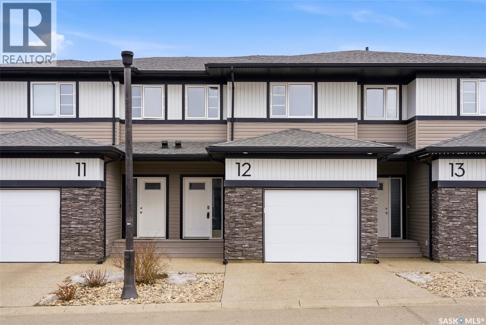 12 5301 Beacon Drive, Regina, SK - Outdoor With Facade