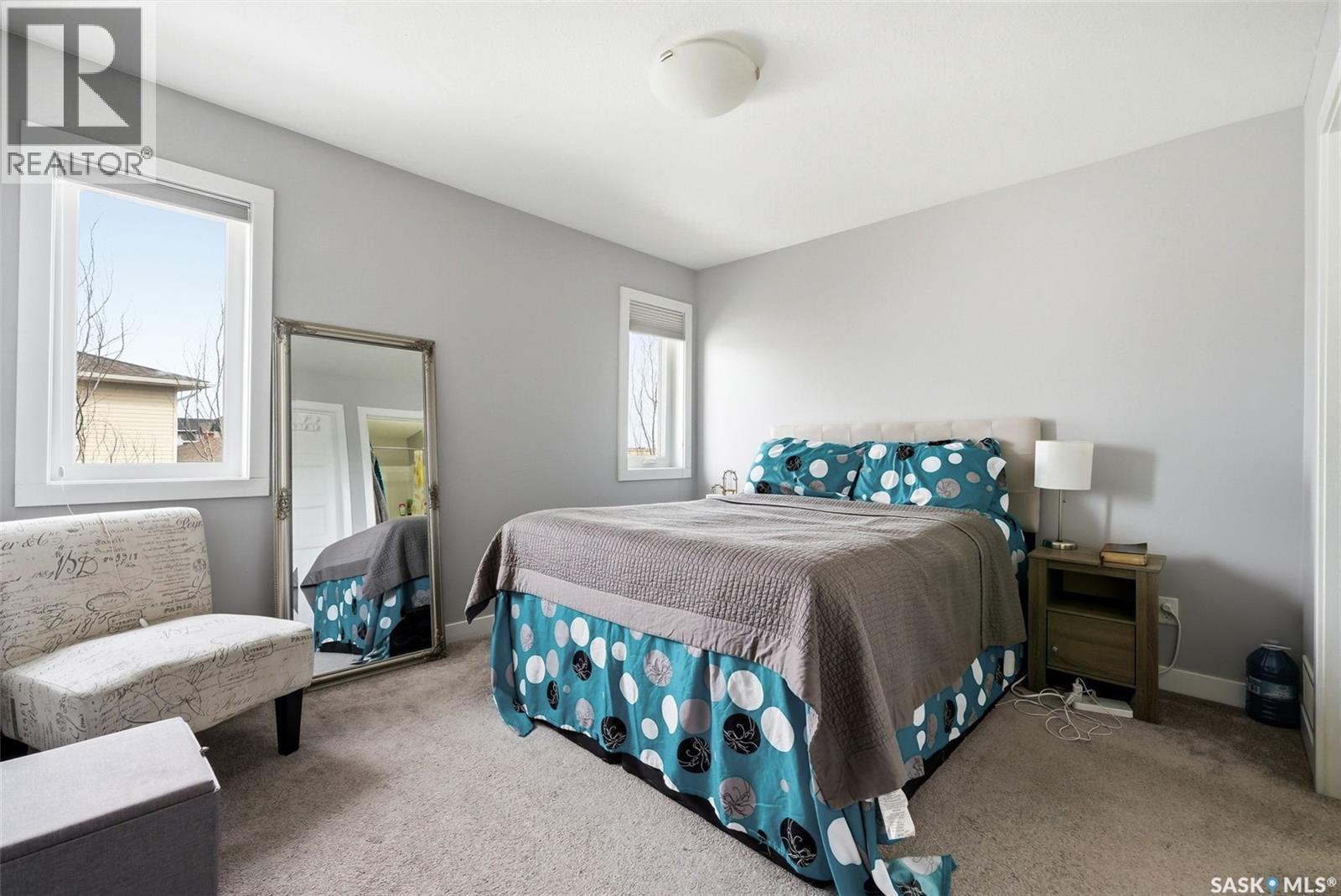 12 5301 Beacon Drive, Regina, SK - Indoor Photo Showing Bedroom