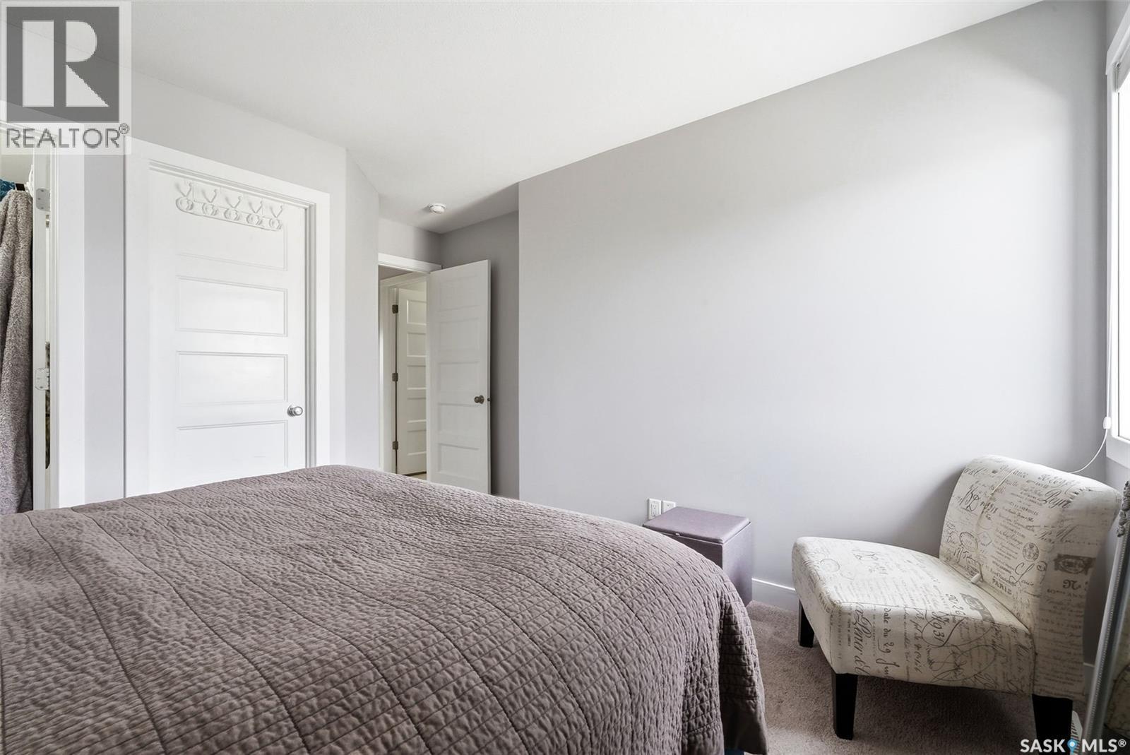 12 5301 Beacon Drive, Regina, SK - Indoor Photo Showing Bedroom