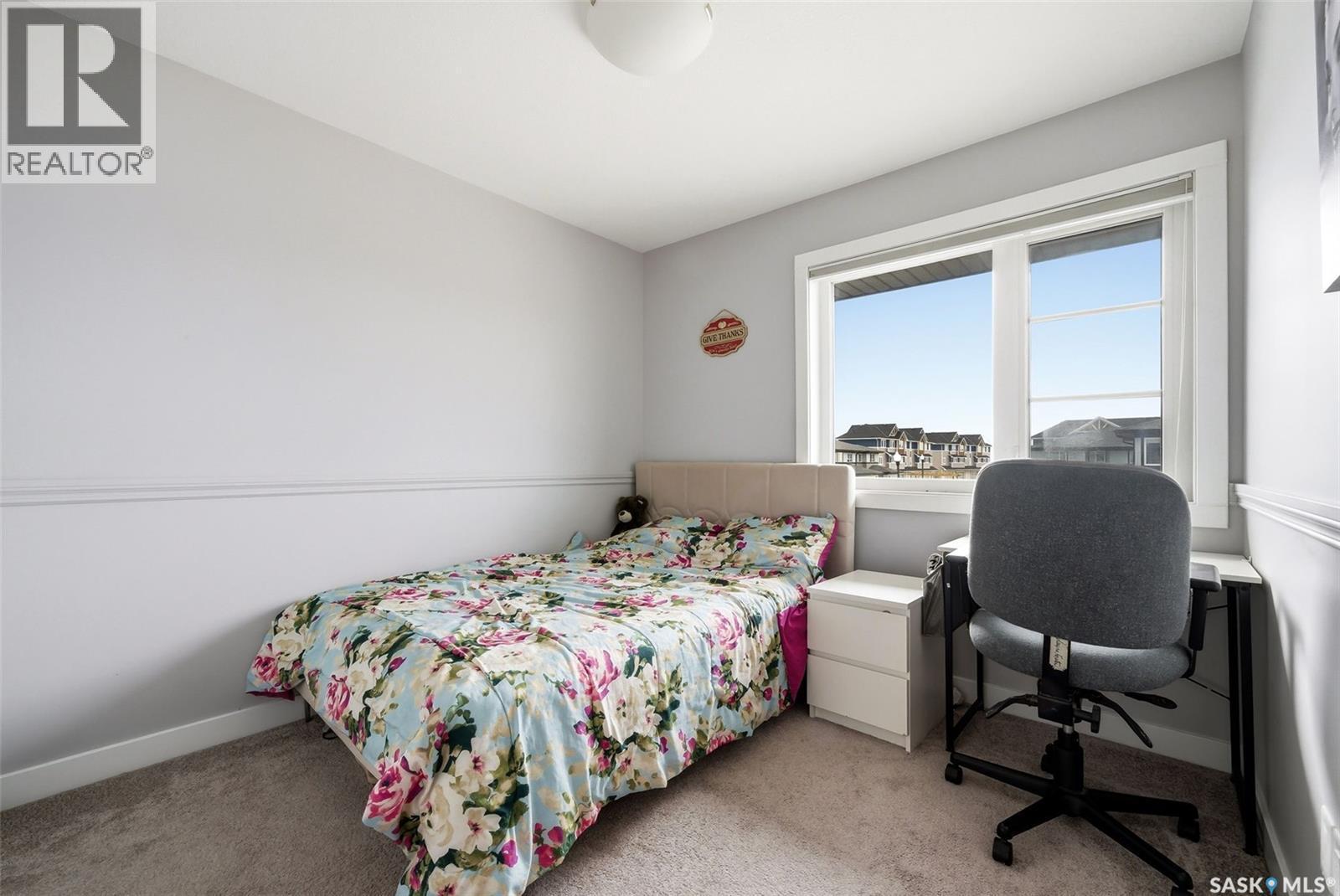 12 5301 Beacon Drive, Regina, SK - Indoor Photo Showing Bedroom