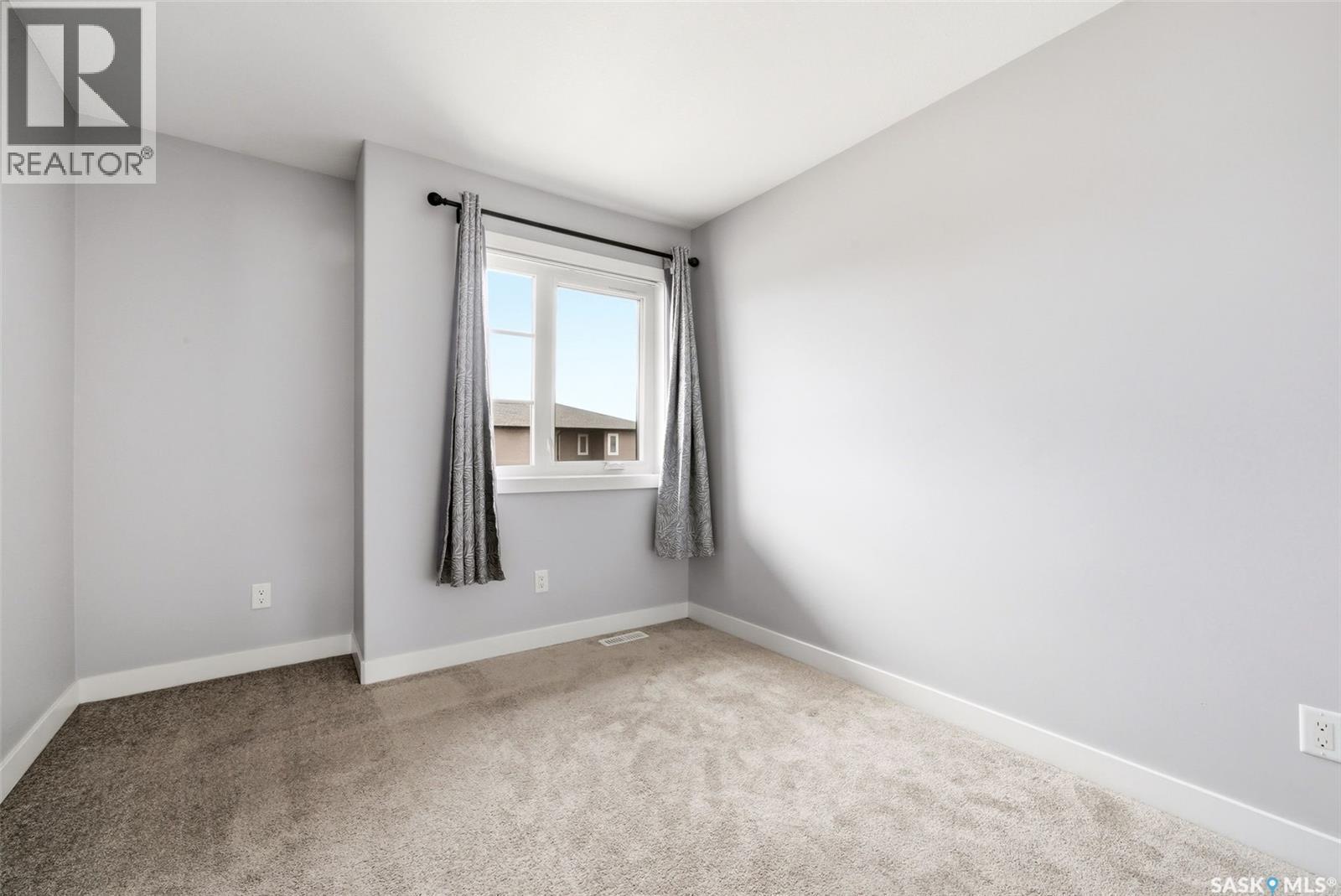 12 5301 Beacon Drive, Regina, SK - Indoor Photo Showing Other Room