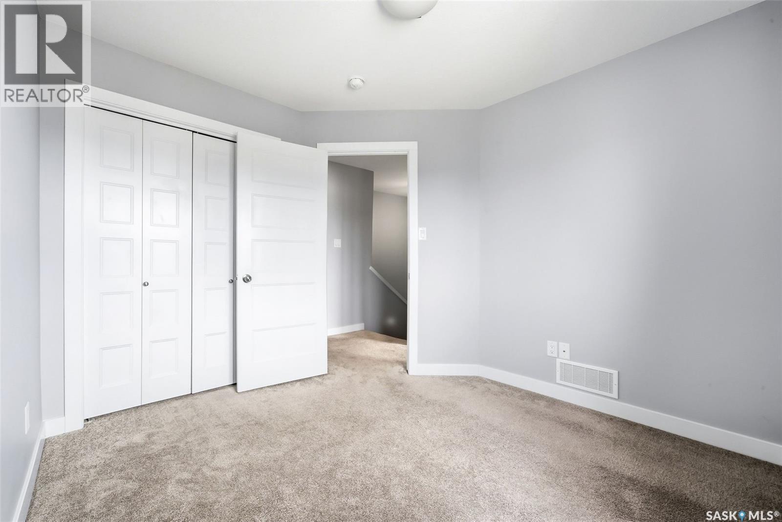 12 5301 Beacon Drive, Regina, SK - Indoor Photo Showing Other Room