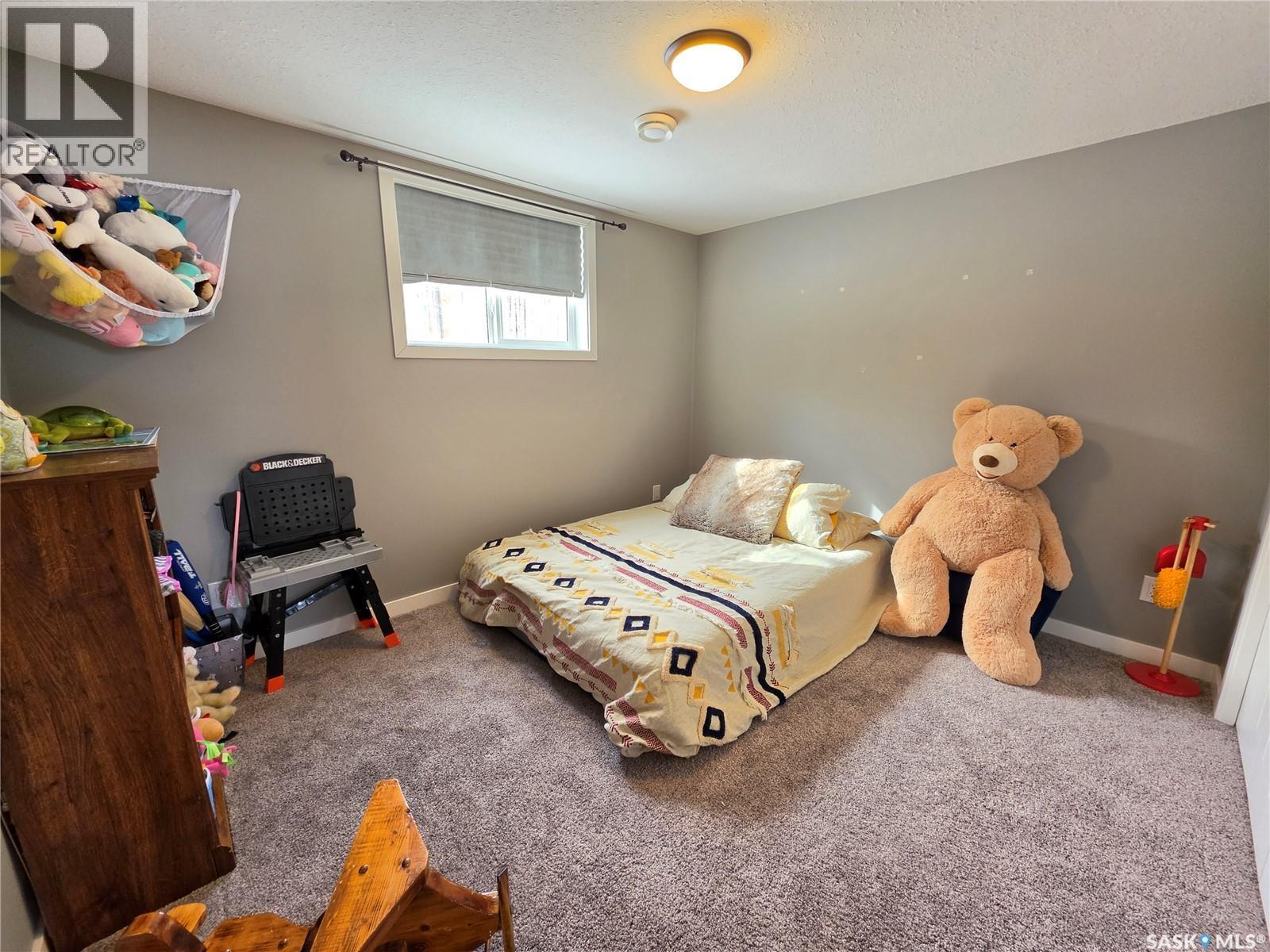 9 Carl Drive, Meadow Lake, SK - Indoor Photo Showing Bedroom