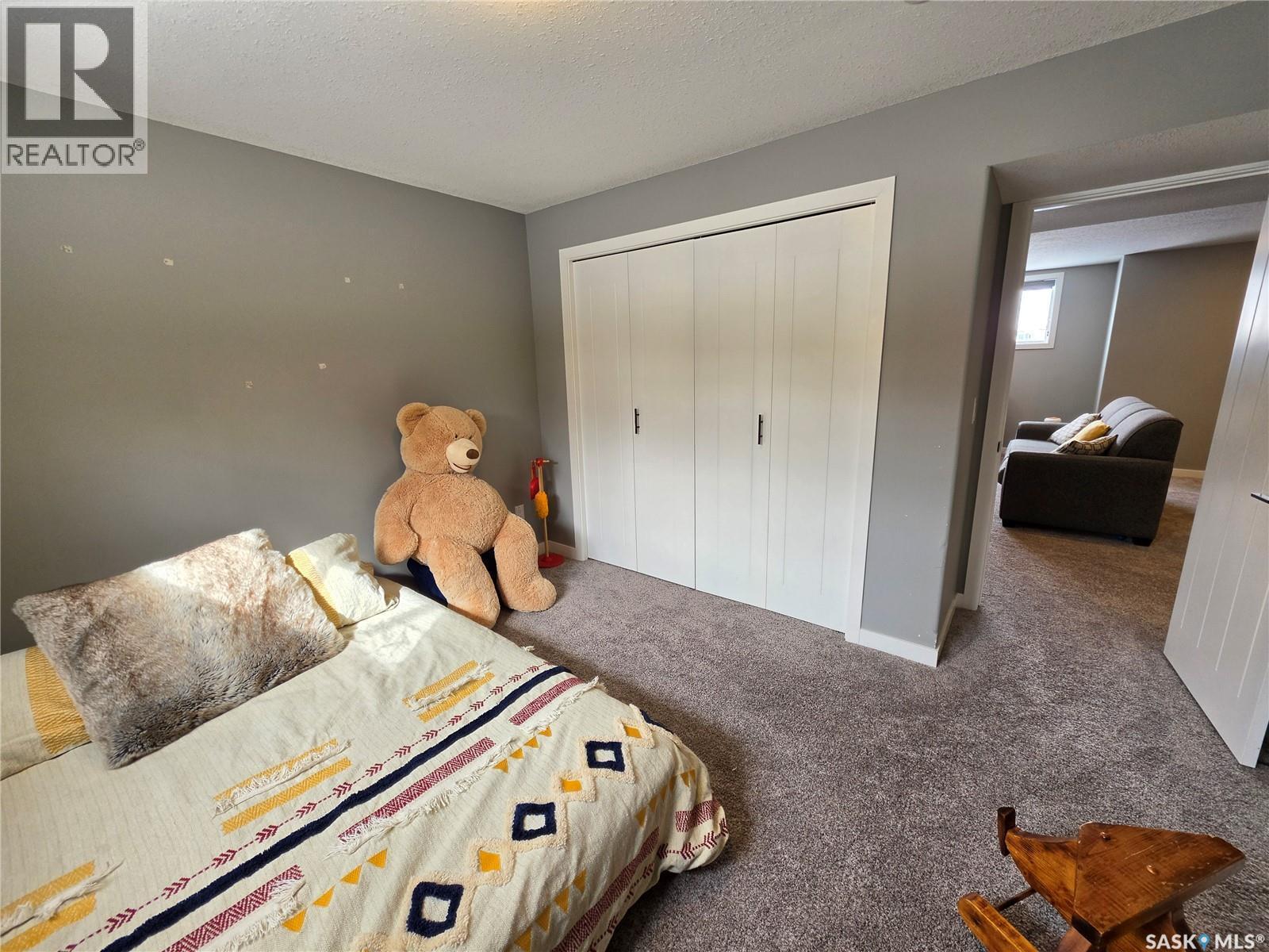 9 Carl Drive, Meadow Lake, SK - Indoor Photo Showing Bedroom