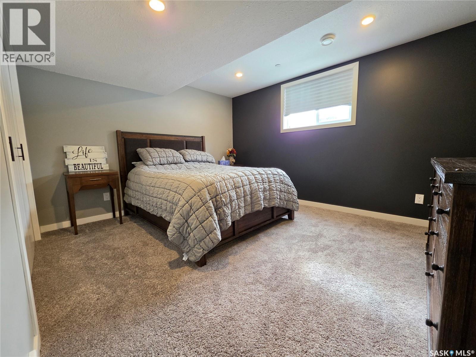 9 Carl Drive, Meadow Lake, SK - Indoor Photo Showing Bedroom