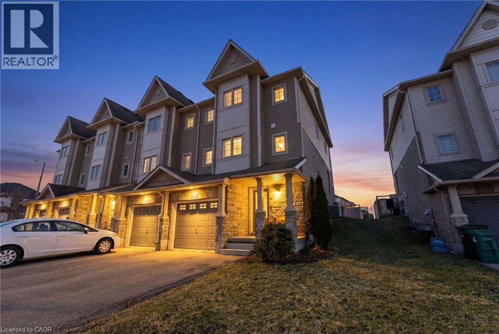 View of front facade featuring asphalt driveway, a lawn, and a porch - 208 Templewood Drive, Kitchener, ON - Outdoor