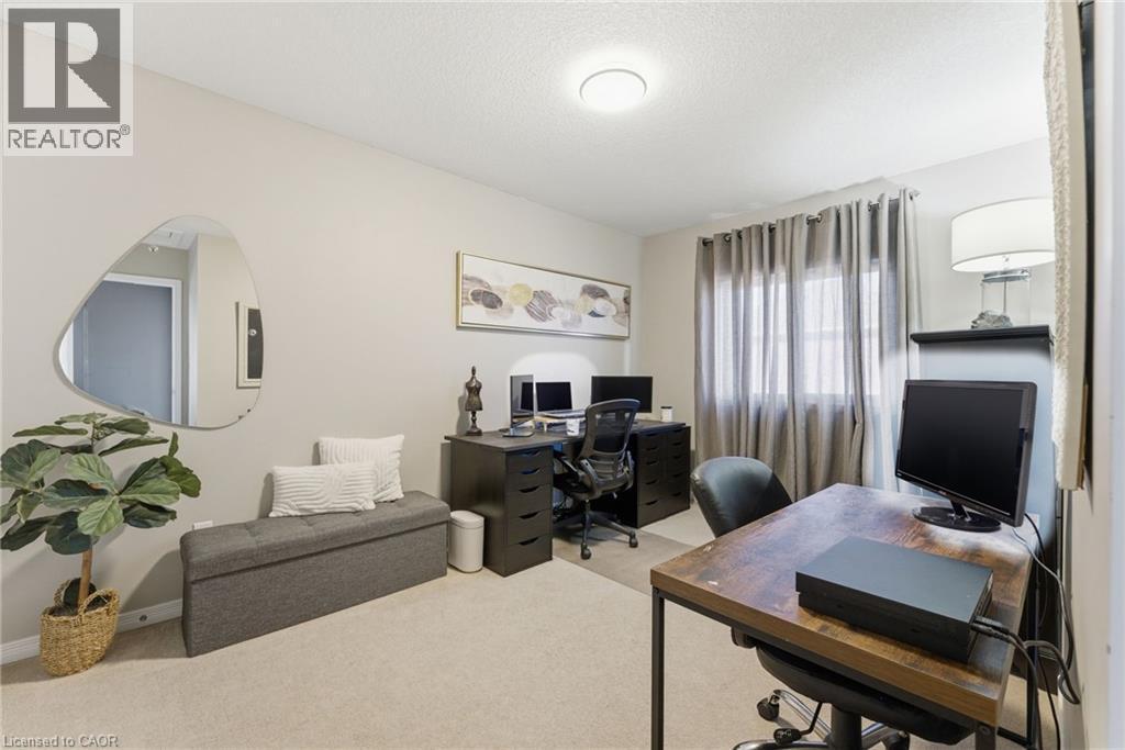 Home office featuring carpet floors and a textured ceiling - 208 Templewood Drive, Kitchener, ON - Indoor Photo Showing Office