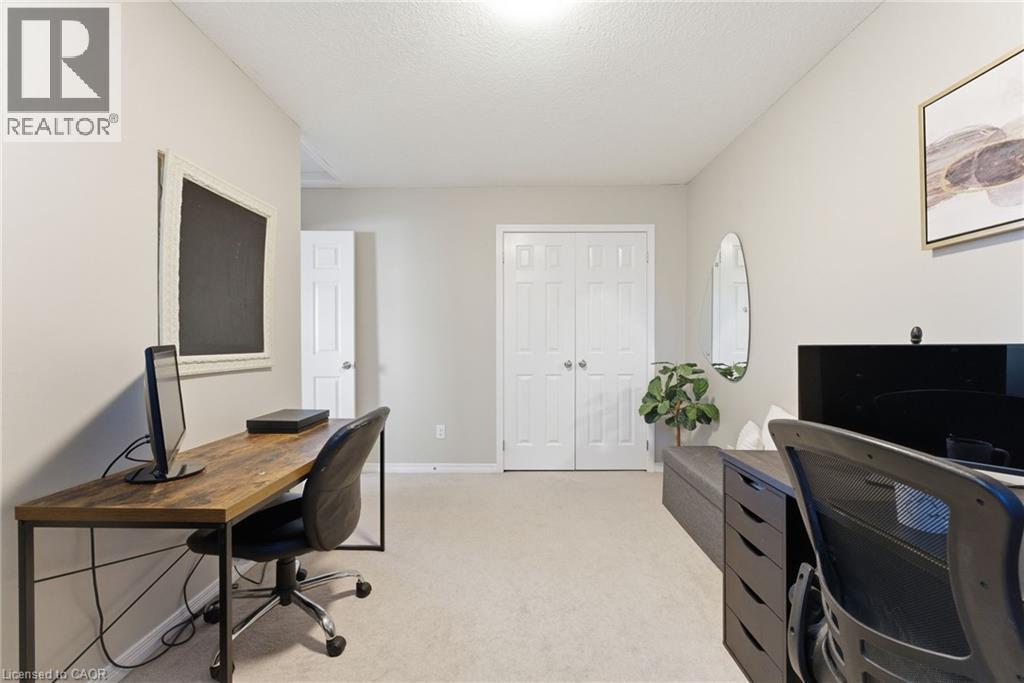 Office space with light colored carpet and a textured ceiling - 208 Templewood Drive, Kitchener, ON - Indoor Photo Showing Office