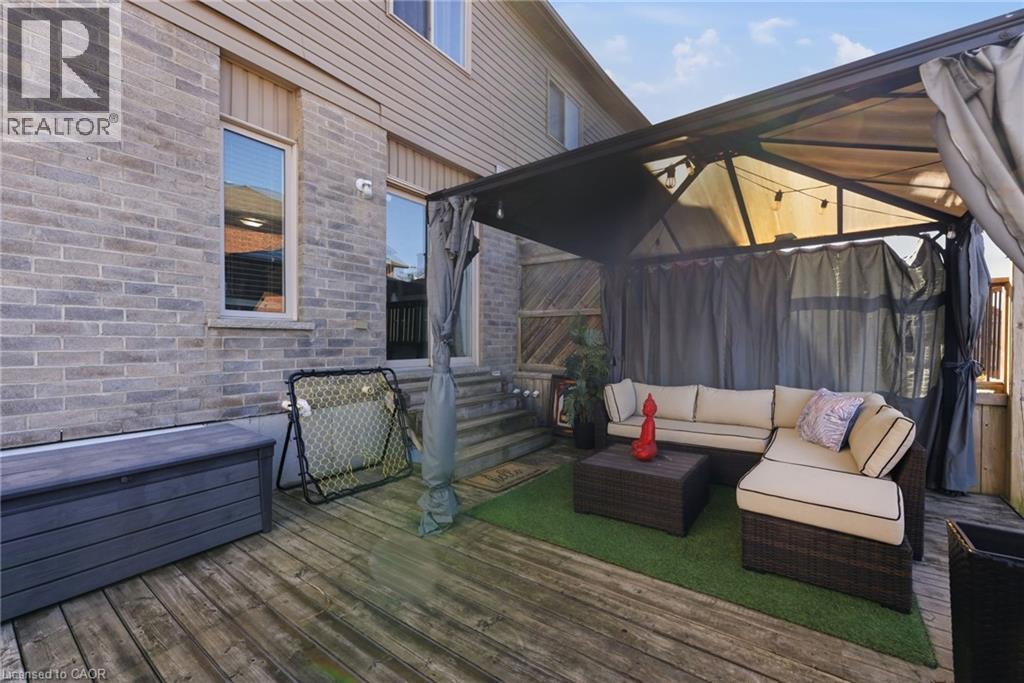 Deck with outdoor lounge area, a fenced backyard, and a gazebo - 208 Templewood Drive, Kitchener, ON - Outdoor With Deck Patio Veranda With Exterior