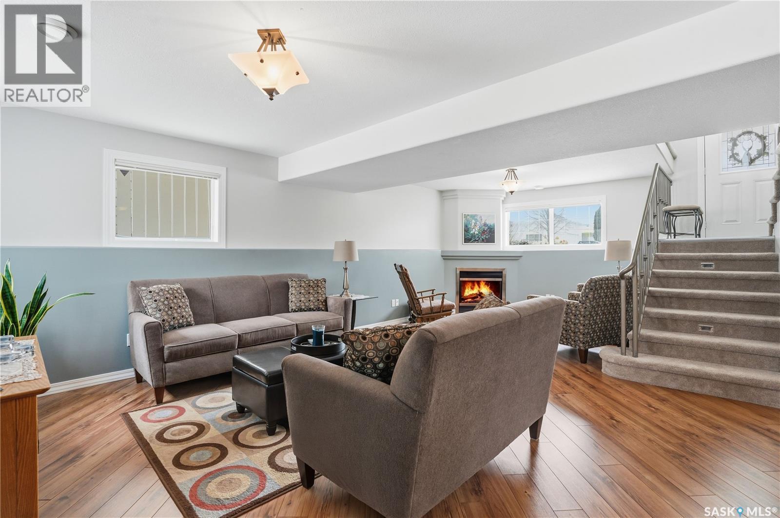 1002 Pezer Crescent, Saskatoon, SK - Indoor Photo Showing Living Room With Fireplace
