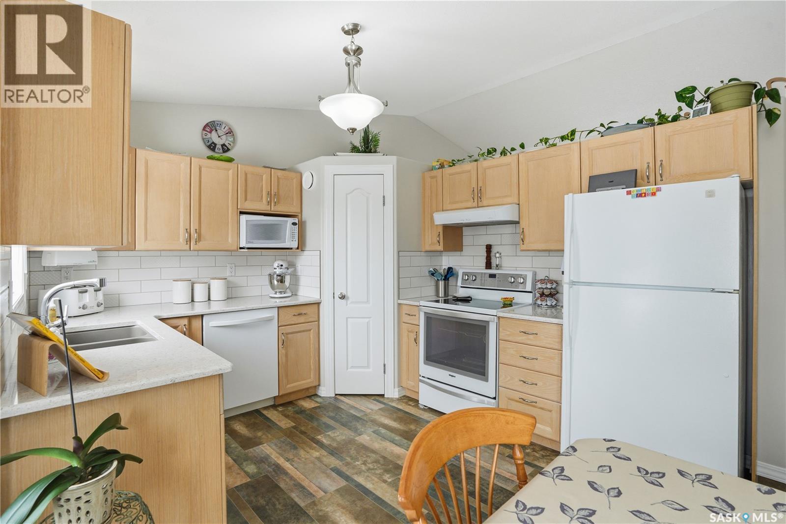 1002 Pezer Crescent, Saskatoon, SK - Indoor Photo Showing Kitchen With Double Sink
