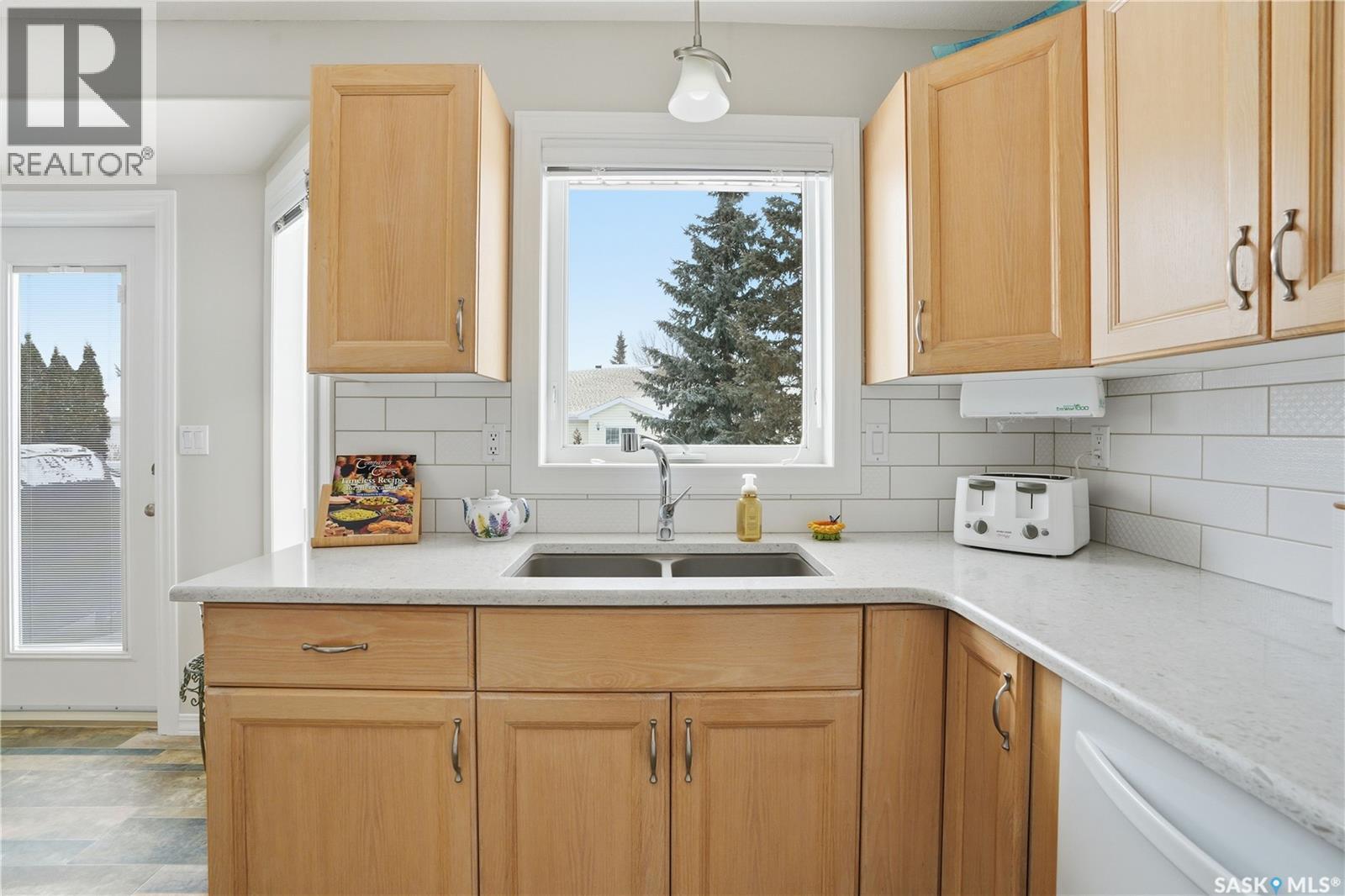 1002 Pezer Crescent, Saskatoon, SK - Indoor Photo Showing Kitchen With Double Sink