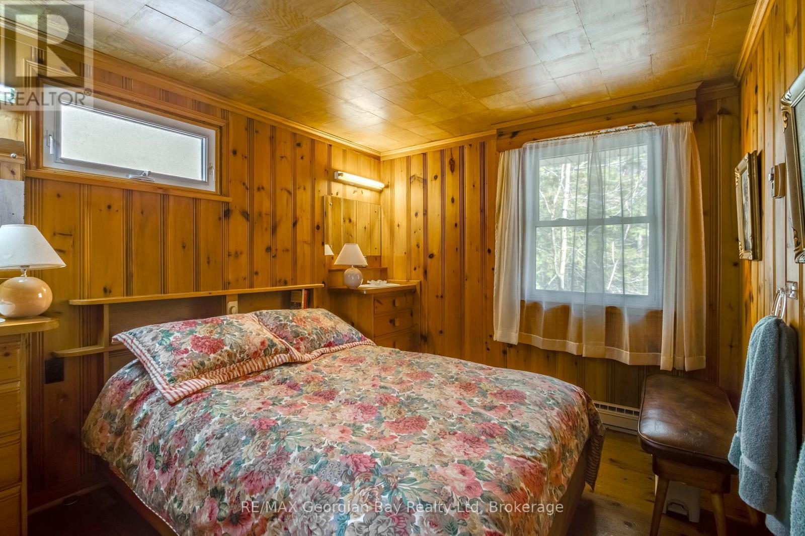 750 Tiny Beaches Road S, Tiny, ON - Indoor Photo Showing Bedroom