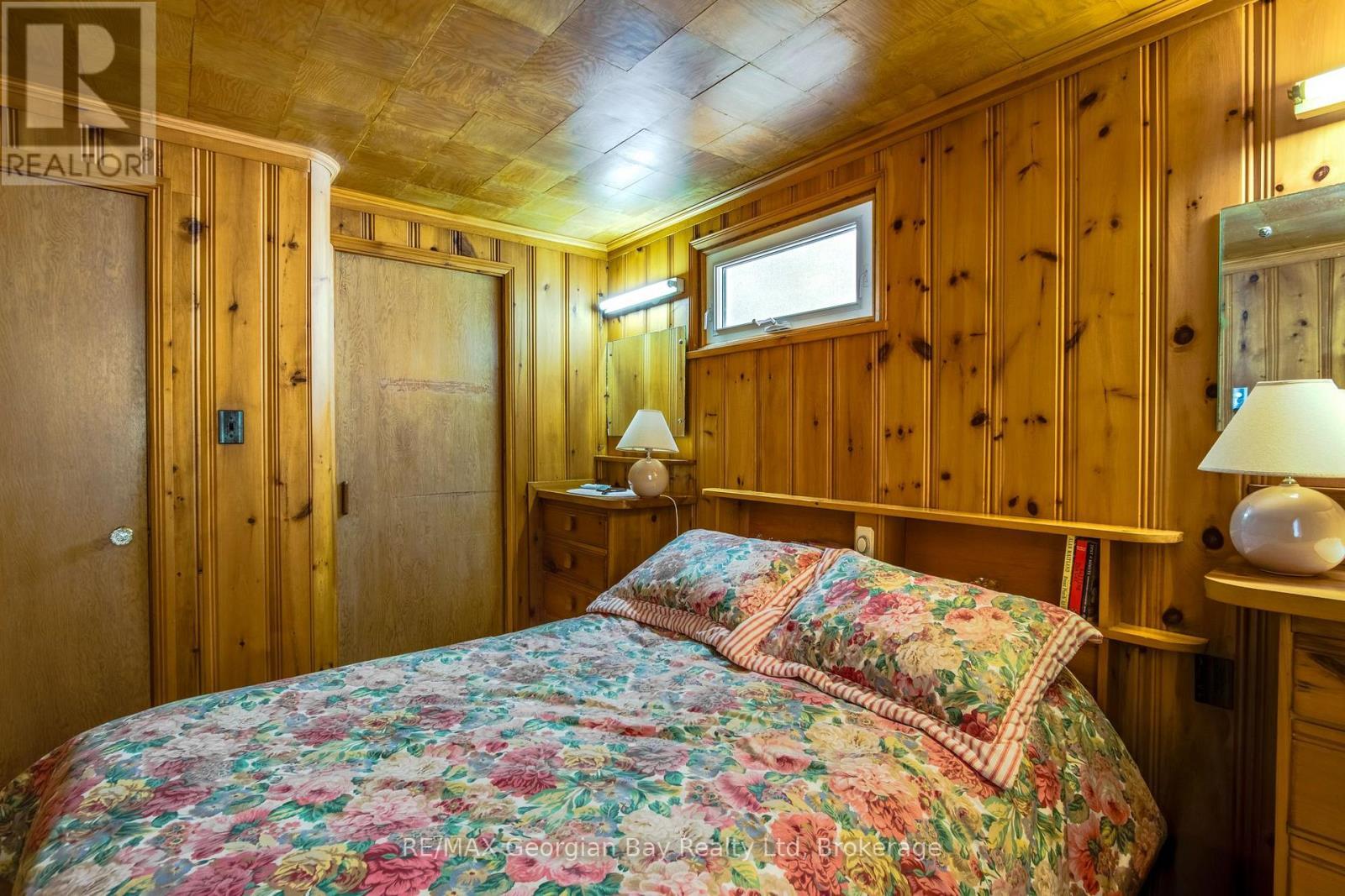 750 Tiny Beaches Road S, Tiny, ON - Indoor Photo Showing Bedroom