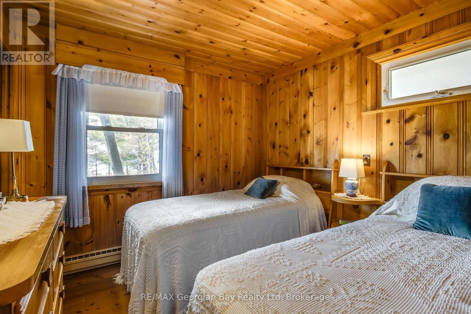 750 Tiny Beaches Road S, Tiny, ON - Indoor Photo Showing Bedroom