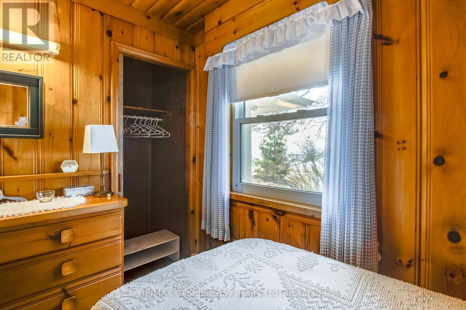 750 Tiny Beaches Road S, Tiny, ON - Indoor Photo Showing Bedroom