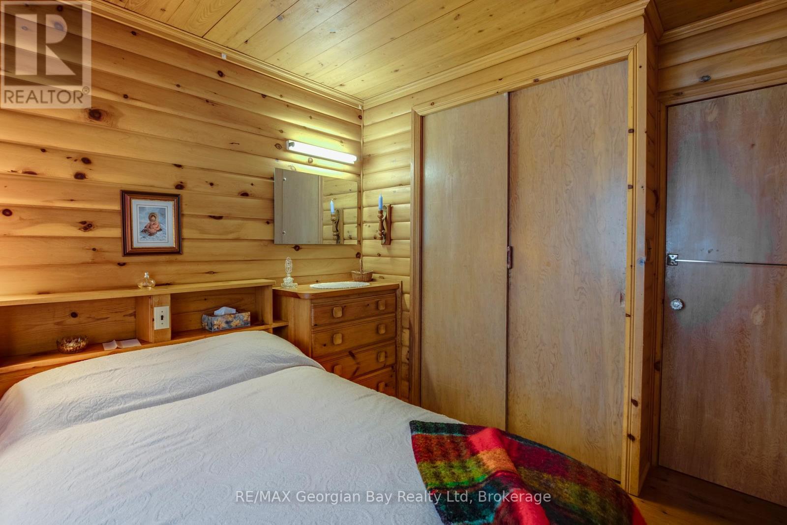 750 Tiny Beaches Road S, Tiny, ON - Indoor Photo Showing Bedroom