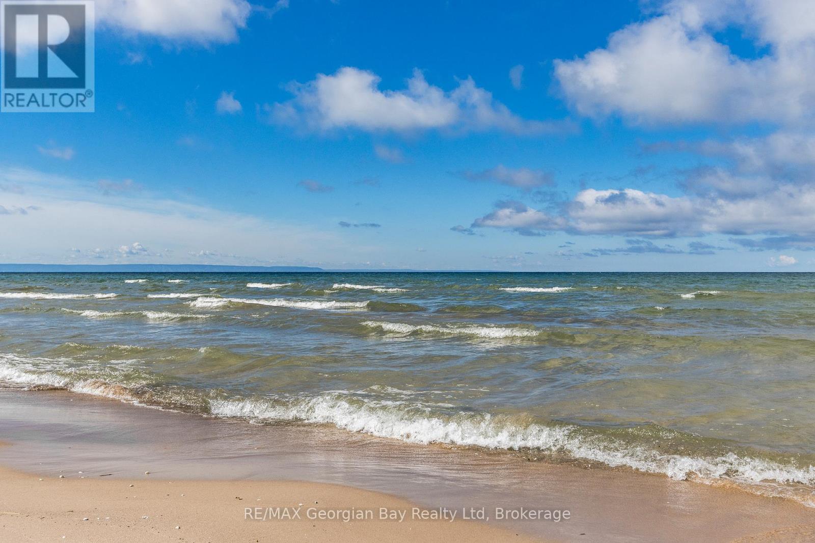 750 Tiny Beaches Road S, Tiny, ON - Outdoor With Body Of Water With View