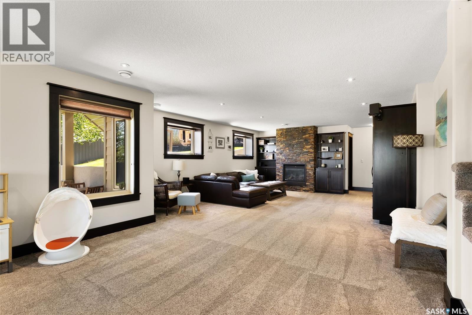 15 Meadow Bay, Lumsden, SK - Indoor With Fireplace