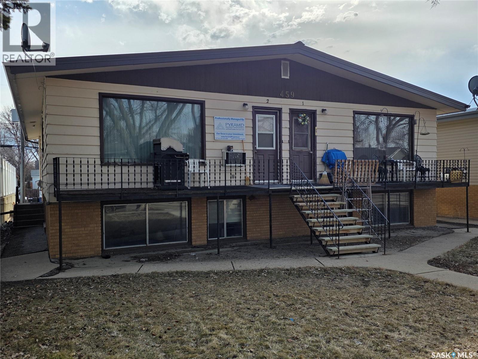 459 6Th Avenue Nw, Swift Current, SK - Outdoor With Deck Patio Veranda