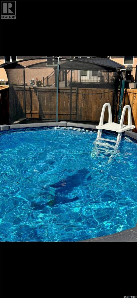 330 Sears Cove, Saskatoon, SK - Outdoor With In Ground Pool