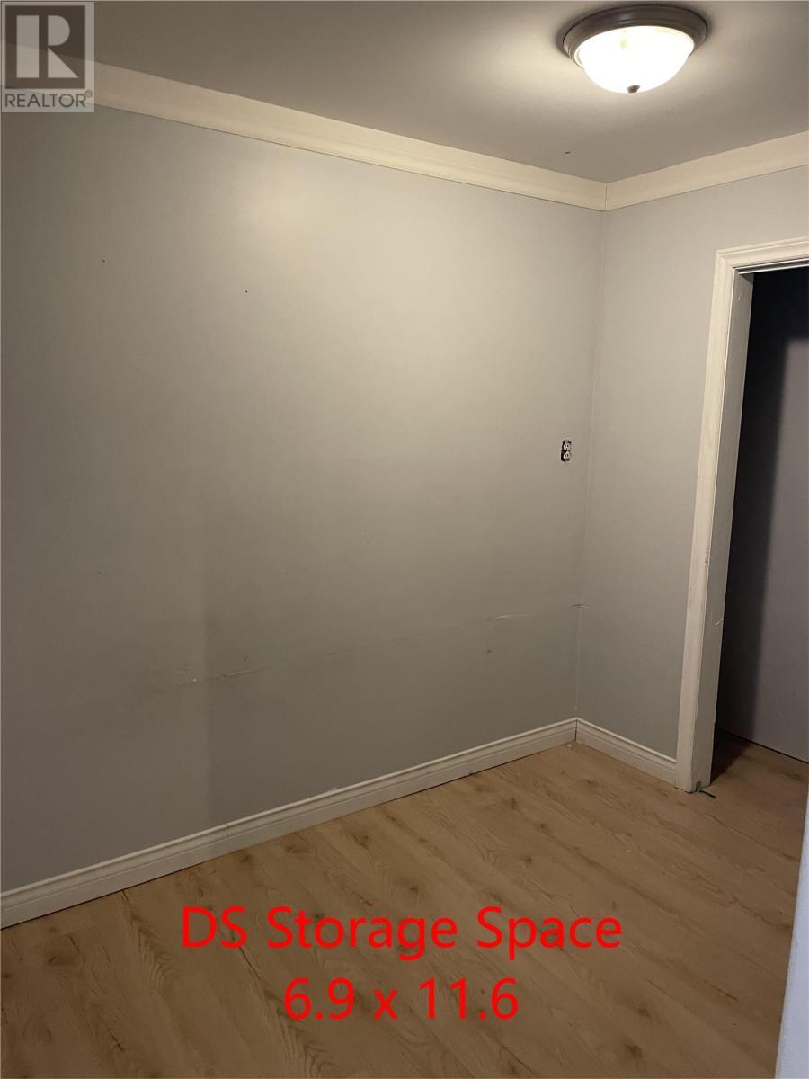 319 Main Road, Come By Chance, NL - Indoor Photo Showing Other Room