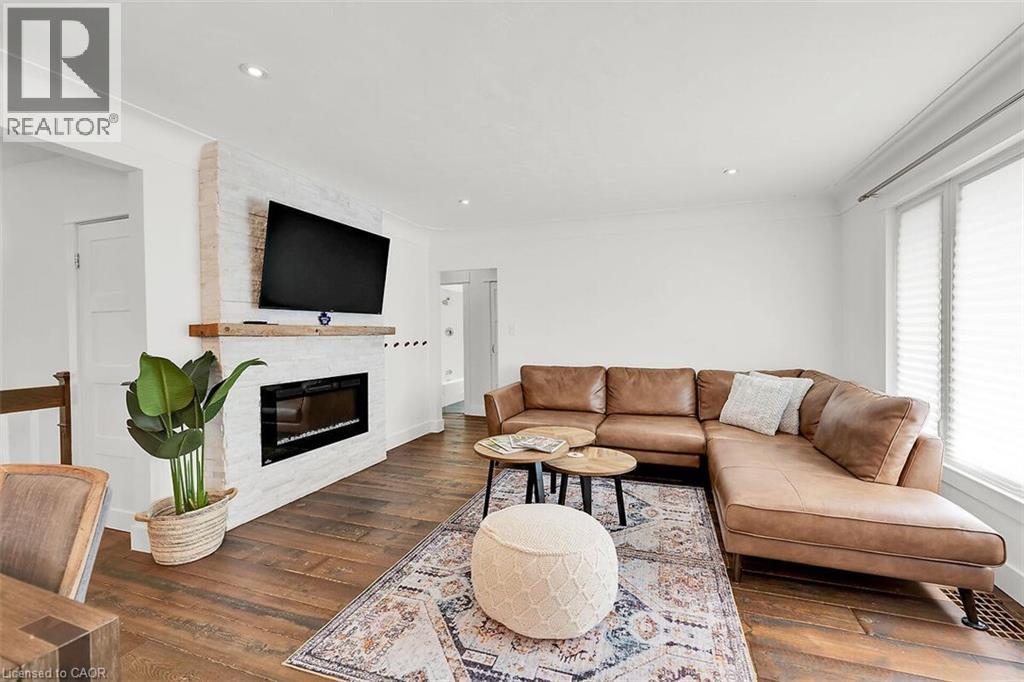 28 Marion Crescent, Dundas, ON - Indoor Photo Showing Living Room With Fireplace