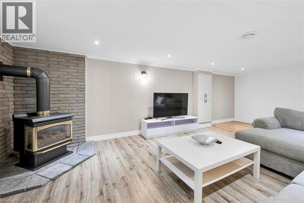 28 Marion Crescent, Dundas, ON - Indoor Photo Showing Living Room With Fireplace