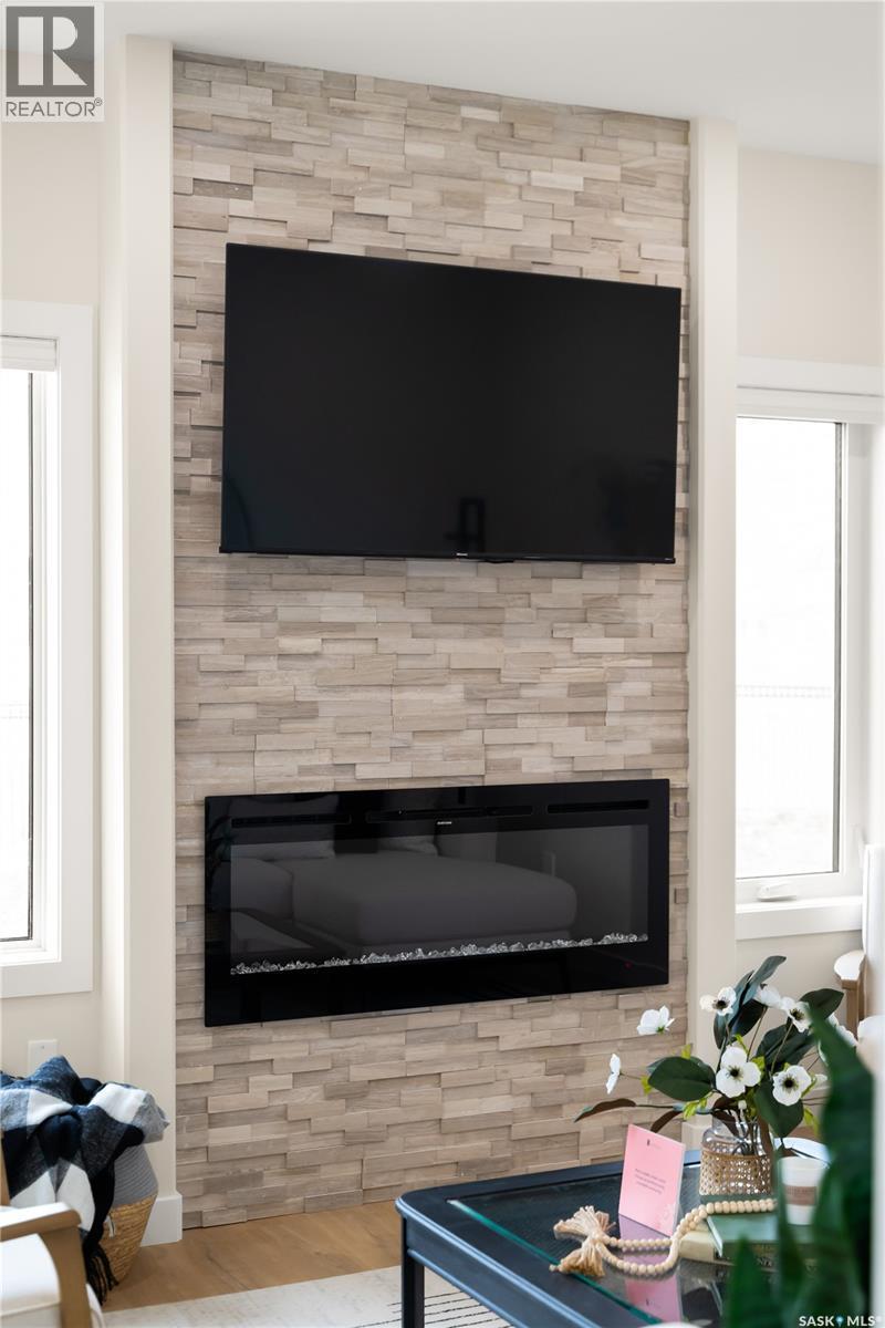 4952 Padwick Road, Regina, SK - Indoor Photo Showing Living Room With Fireplace