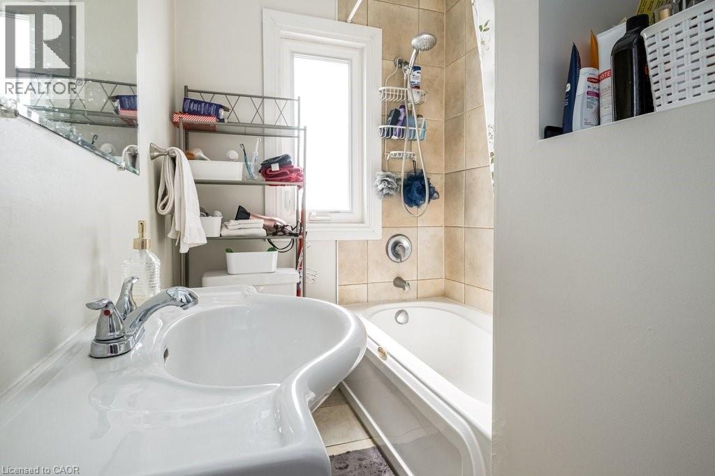 Convenient shelf on the right for added storage. - 500 Ferguson Avenue N, Hamilton, ON - Indoor Photo Showing Bathroom