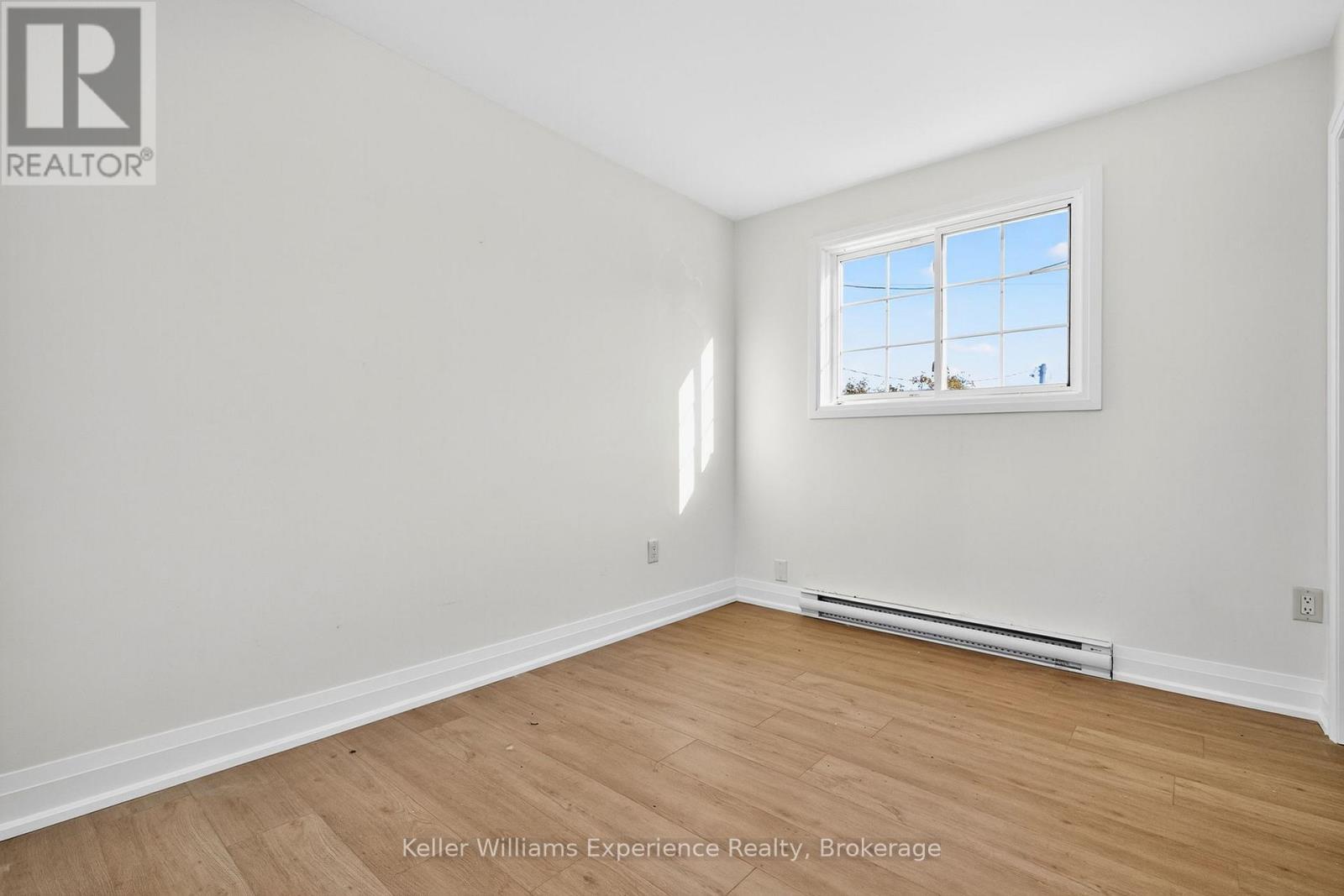 556 Champlain Road, Tiny, ON - Indoor Photo Showing Other Room