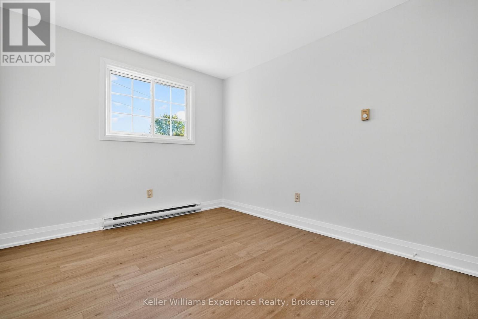 556 Champlain Road, Tiny, ON - Indoor Photo Showing Other Room