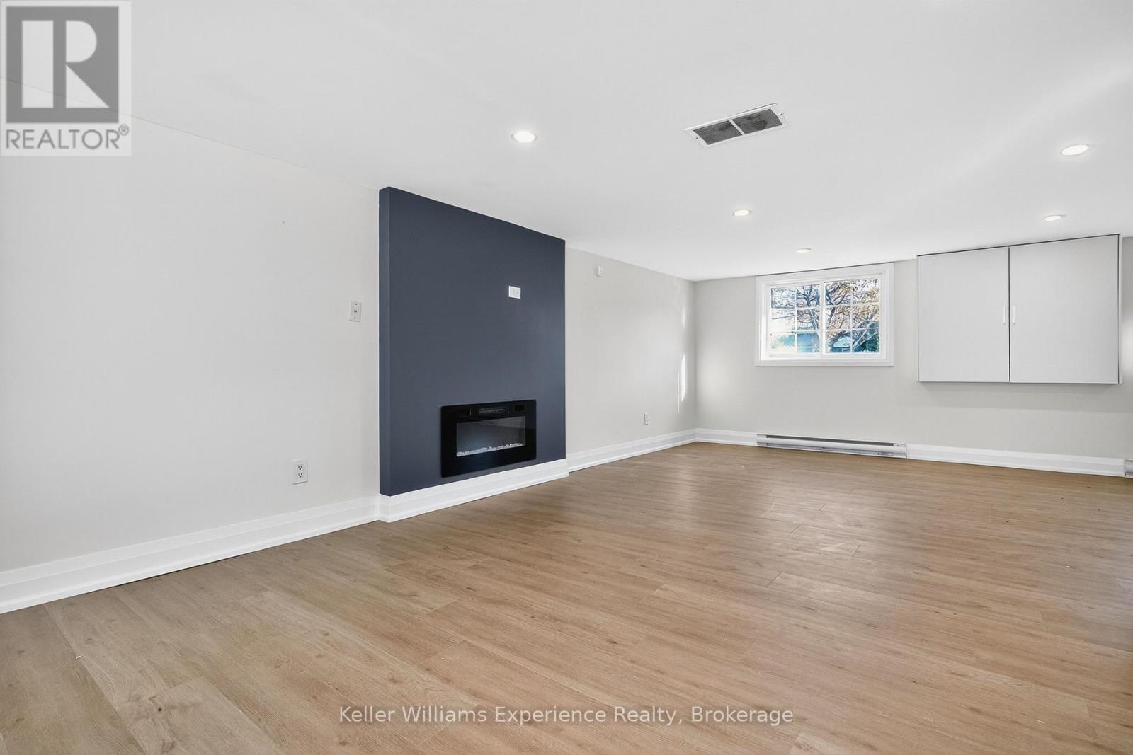 556 Champlain Road, Tiny, ON - Indoor With Fireplace