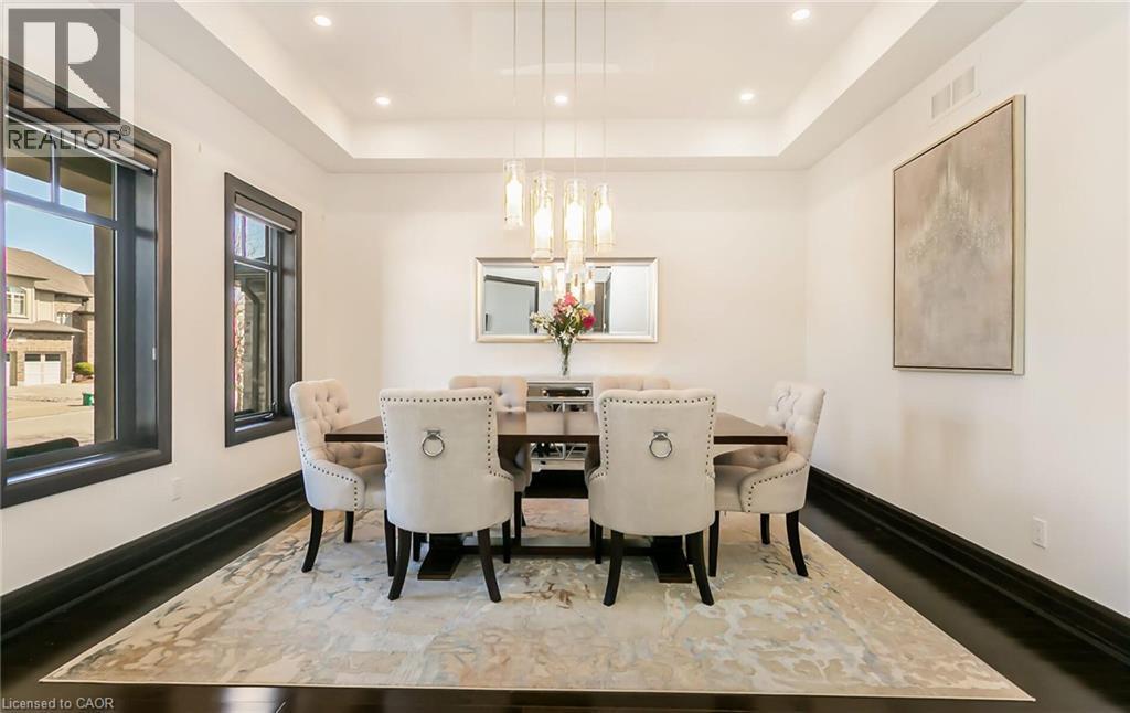 Dining area featuring a tray ceiling and recessed lighting - 24 Jacob Gingrich Drive, Kitchener, ON - Indoor Photo Showing Dining Room