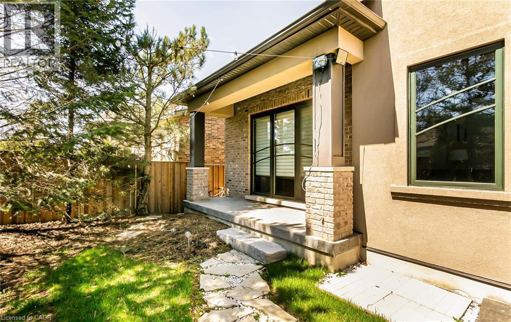 Entrance to property with stucco siding - 24 Jacob Gingrich Drive, Kitchener, ON - Outdoor With Deck Patio Veranda
