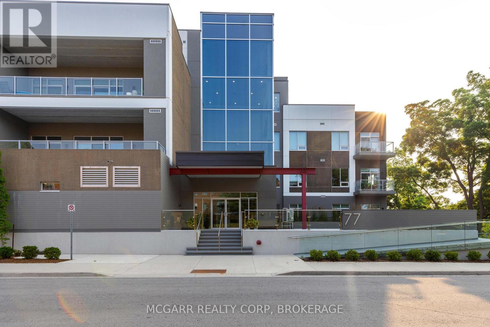 Storey glass atrium - 403 - 77 Yates Street, St. Catharines (Downtown), ON - Outdoor With Balcony