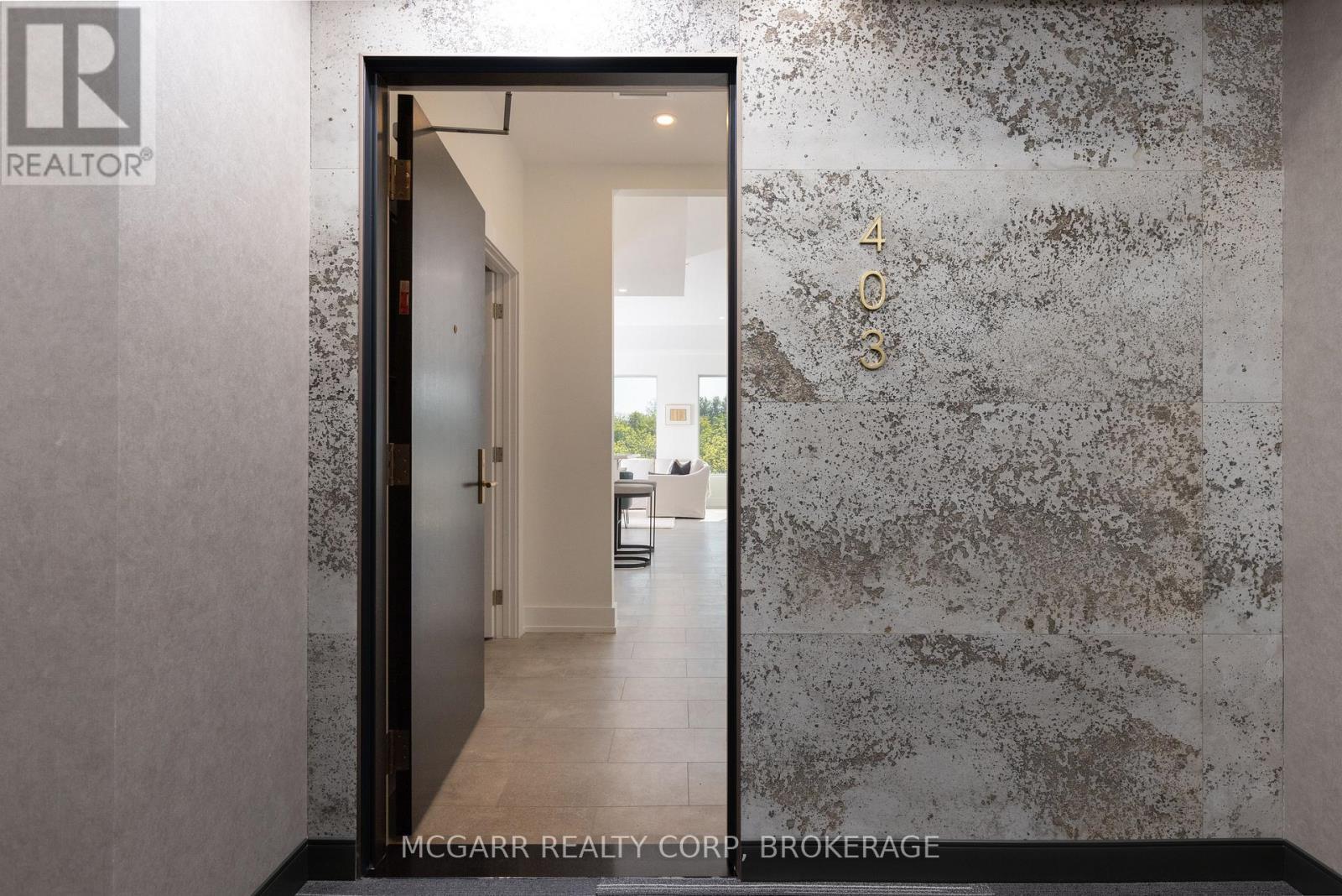 Stone walled entry - 403 - 77 Yates Street, St. Catharines (Downtown), ON -