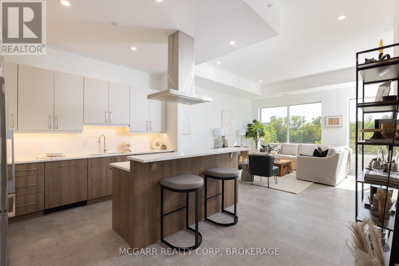 Open kitchen, living + dining - 403 - 77 Yates Street, St. Catharines (Downtown), ON - Indoor Photo Showing Kitchen With Upgraded Kitchen