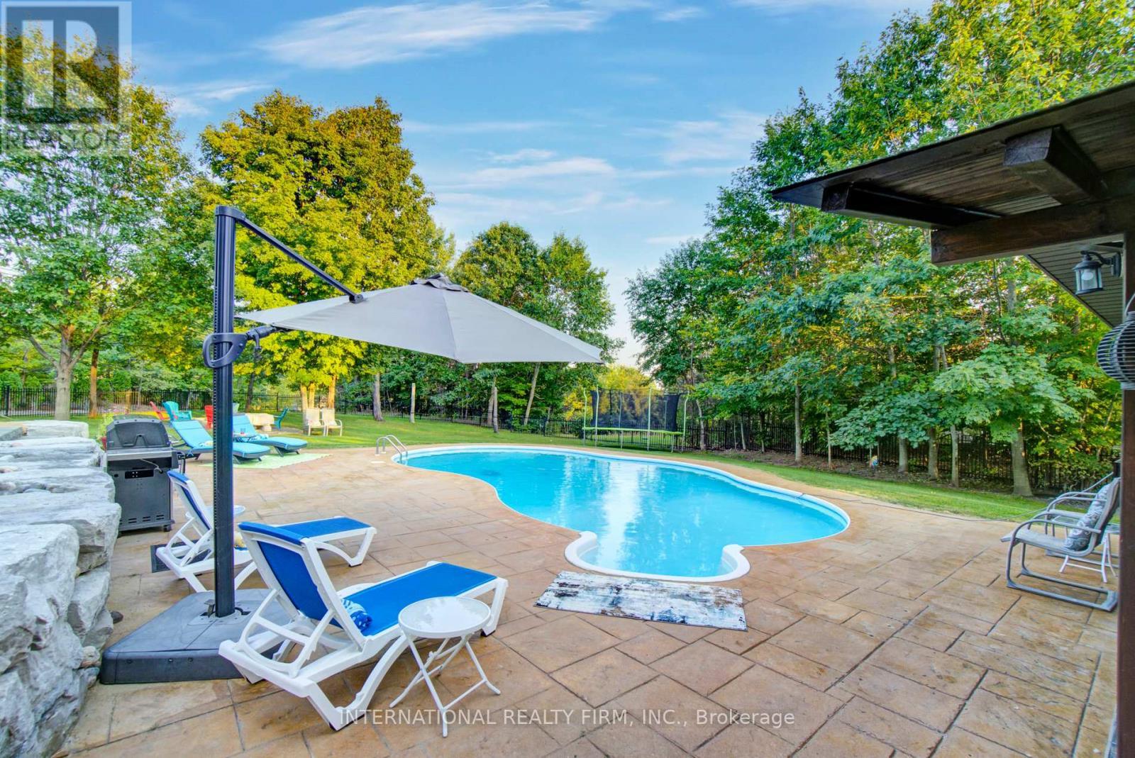6 Pinehurst Lane, Springwater, ON - Outdoor With In Ground Pool With Backyard