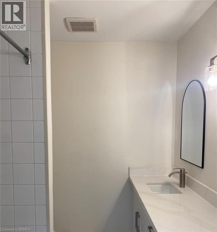 Bathroom featuring vanity and a shower - 151 Siebert Avenue, Kitchener, ON - Indoor Photo Showing Bathroom