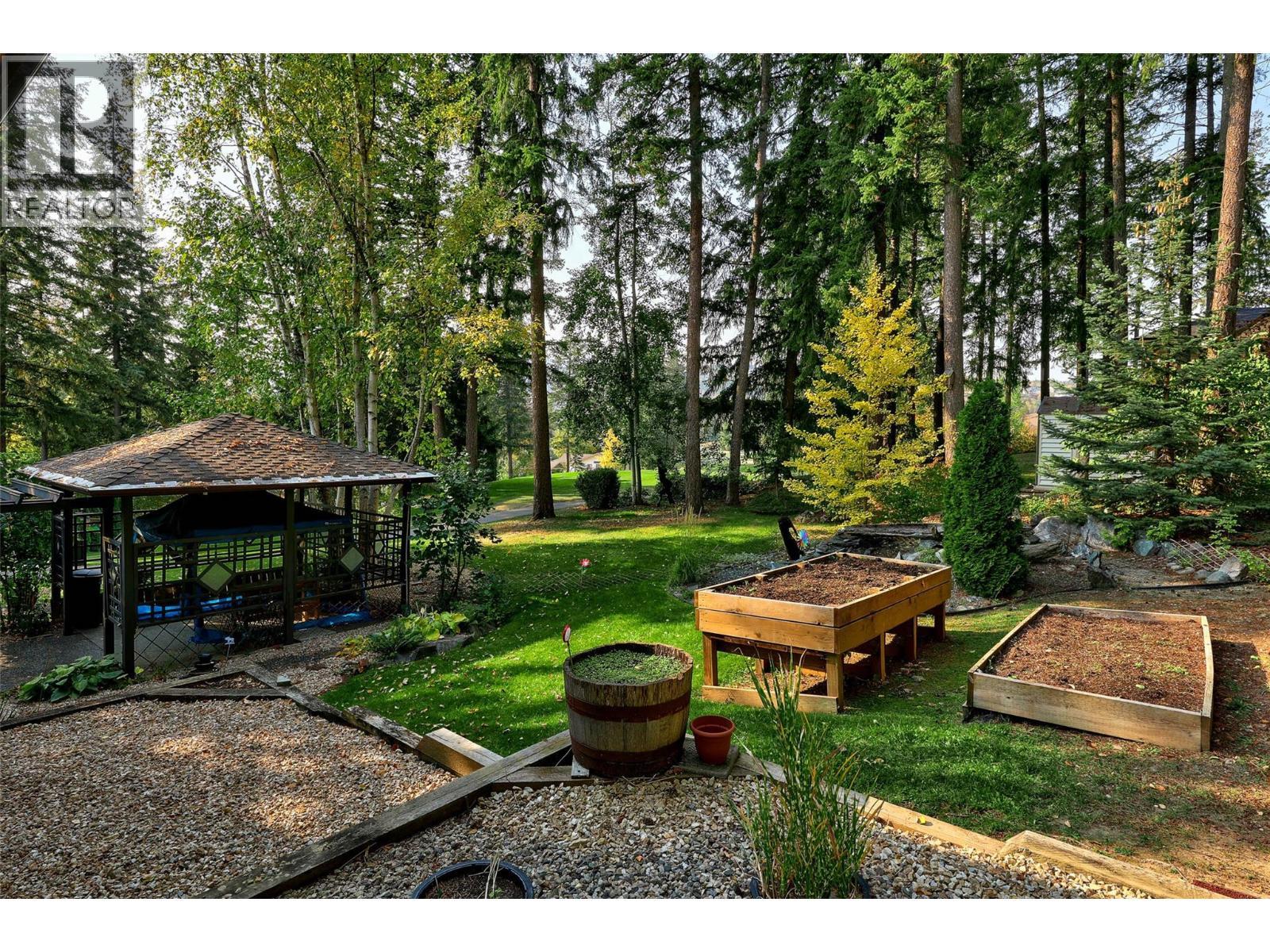 2668 Golf Course Drive, Blind Bay, BC - Outdoor With Backyard