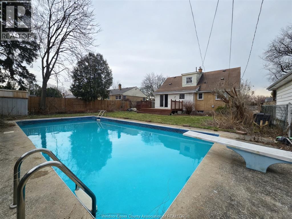 3672 Morris Drive, Windsor, ON - Outdoor With In Ground Pool With Backyard