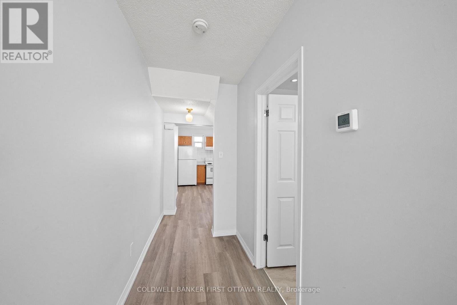 Hallway to bathroom/kitchen w under stair storage. - 234 Rochester Street, Ottawa, ON - Indoor Photo Showing Other Room