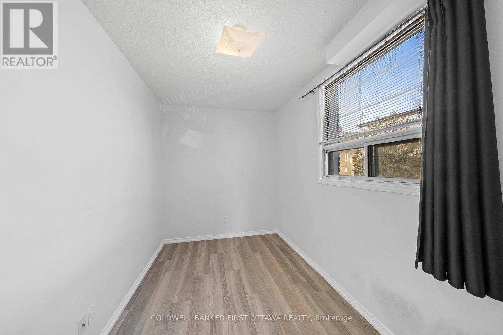 Bedroom w window and fixture above. - 234 Rochester Street, Ottawa, ON - Indoor Photo Showing Other Room