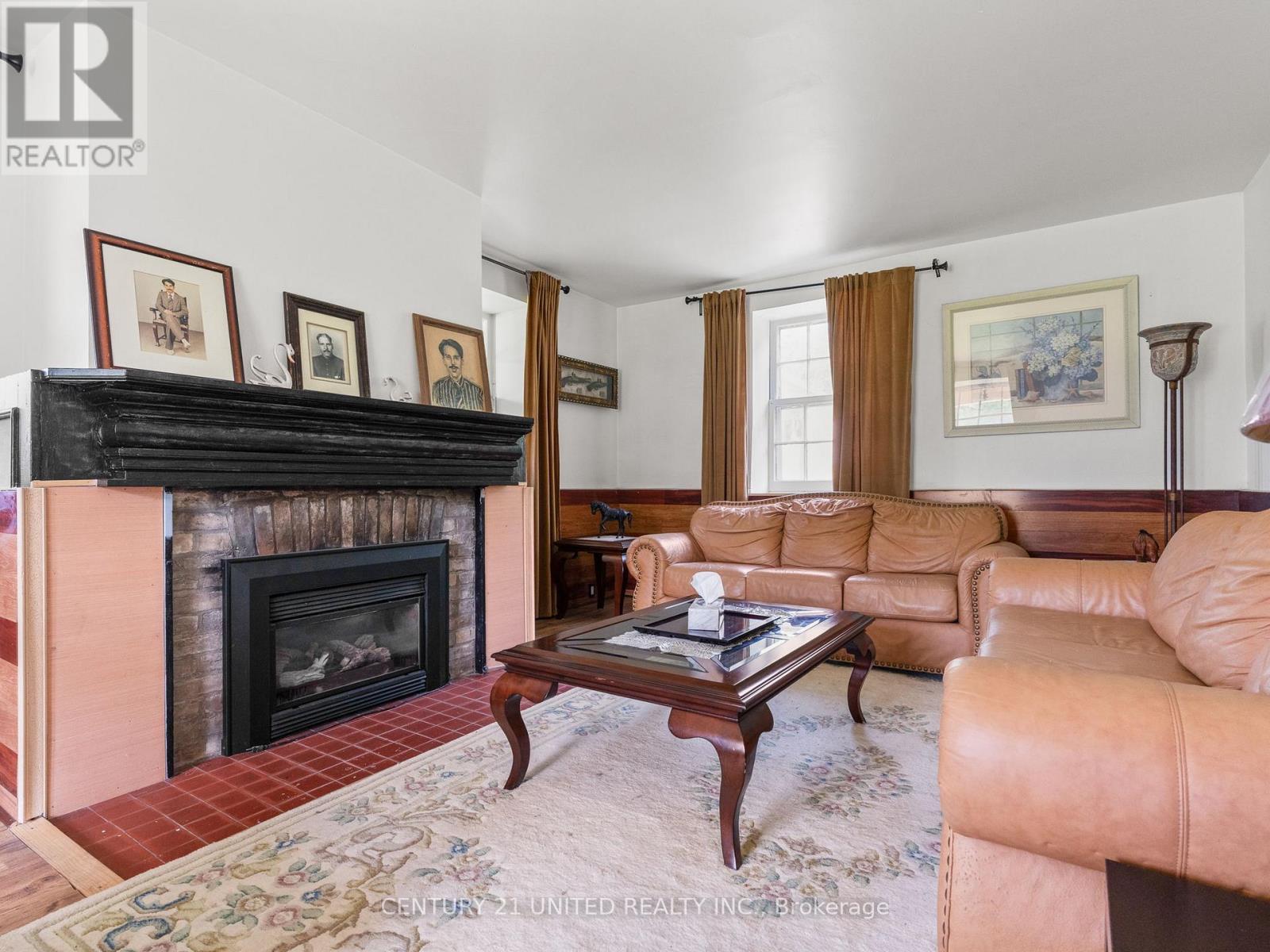9340 Danforth Road E, Cobourg, ON - Indoor Photo Showing Living Room With Fireplace